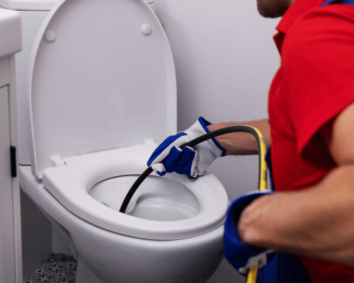 plumber-repairing-a-toilet-winchester-ma