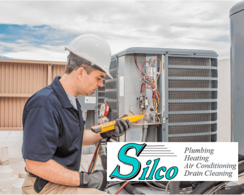 hvac-contractor-repairing